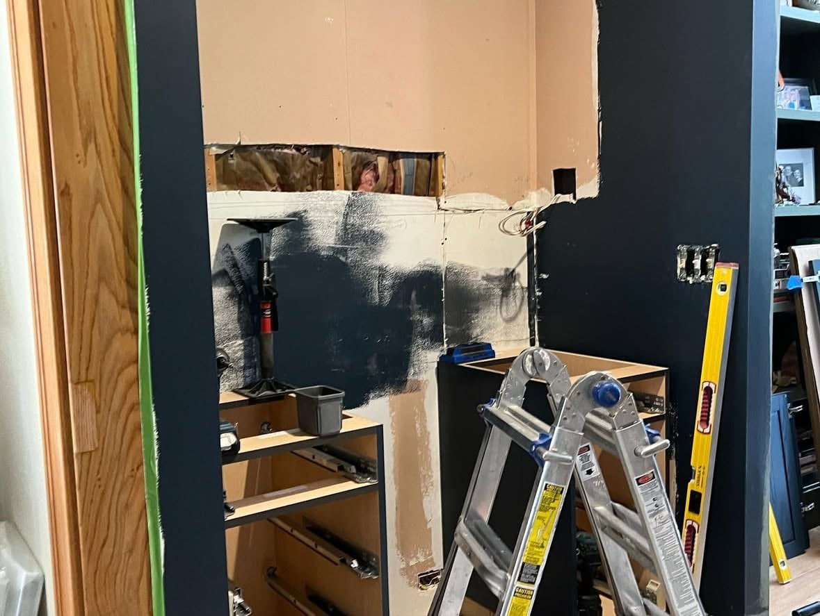Cabinet alcove during early demo and prep